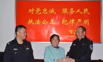 济源市邵州公安分局举行退赃会 20万元被骗现金退还群众